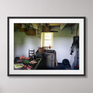 A beautifully detailed photograph of an 18th-century kitchen at White Hall Mansion in Richmond, Kentucky, featuring rustic cookware, fresh produce, and a vintage window with natural light.