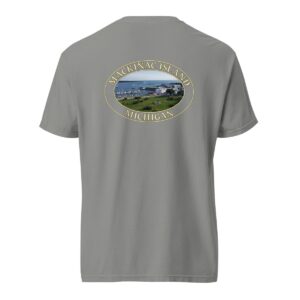 Grey Comfort Colors 1717 heavyweight T-shirt featuring Mackinac Island harbor and downtown graphic with boats and historic buildings in an oval design.