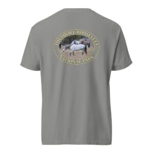 Grey Comfort Colors 1717 heavyweight T-shirt featuring a graphic of wild horses grazing in Theodore Roosevelt National Park’s grasslands, in an oval design.