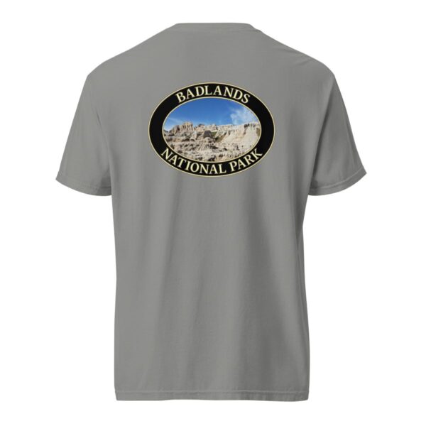 Grey Comfort Colors 1717 heavyweight T-shirt featuring a scenic graphic of Badlands National Park, framed in an oval design.