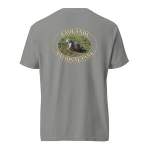 Grey Comfort Colors 1717 heavyweight T-shirt featuring a graphic of a prairie dog at Badlands National Park, framed in an oval design.