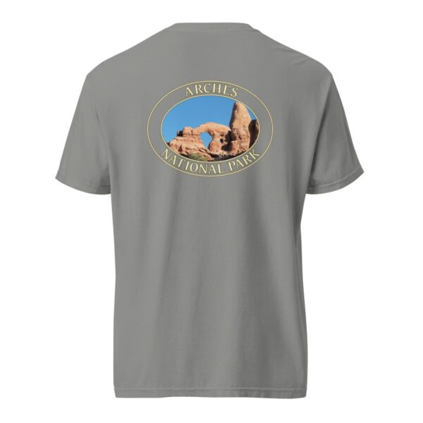 Grey Comfort Colors heavyweight T-shirt featuring a scenic view of Turret Arch at Arches National Park, framed in an oval border.