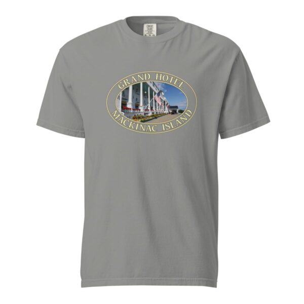 Grey Comfort Colors 1717 heavyweight T-shirt featuring a Grand Hotel graphic on Mackinac Island with iconic white porch and American flags in an oval design.