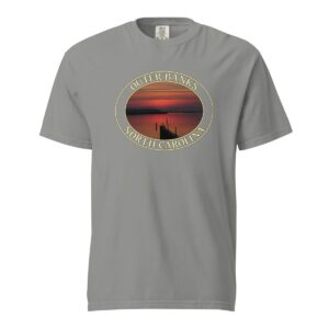 Grey Comfort Colors 1717 heavyweight T-shirt featuring Albemarle Sound sunset graphic on the Outer Banks, with a silhouetted pier and vibrant red sky in an oval design.