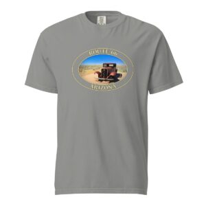 Grey Comfort Colors 1717 heavyweight T-shirt featuring an antique car on Route 66 near Holbrook, Arizona, with a desert background in an oval graphic.