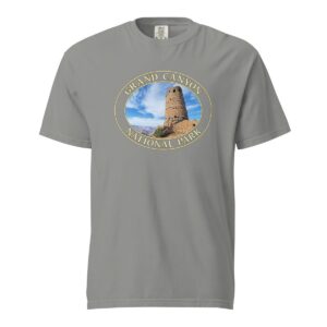 Grey Comfort Colors 1717 heavyweight T-shirt featuring a Watchtower at Grand Canyon National Park graphic in an oval design under a blue sky.