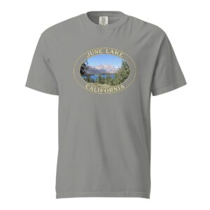 Grey Comfort Colors 1717 heavyweight T-shirt featuring a scenic June Lake in California graphic with mountains, trees, and lake view in an oval design.