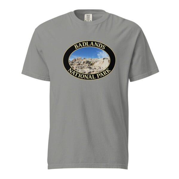 Grey Comfort Colors 1717 heavyweight T-shirt featuring a scenic graphic of Badlands National Park, framed in an oval design.