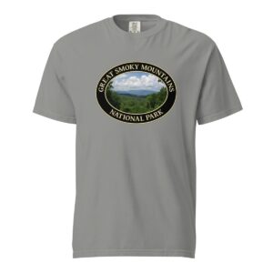 Grey Comfort Colors heavyweight T-shirt featuring a scenic Great Smoky Mountains design from Tennessee, framed in an oval border.