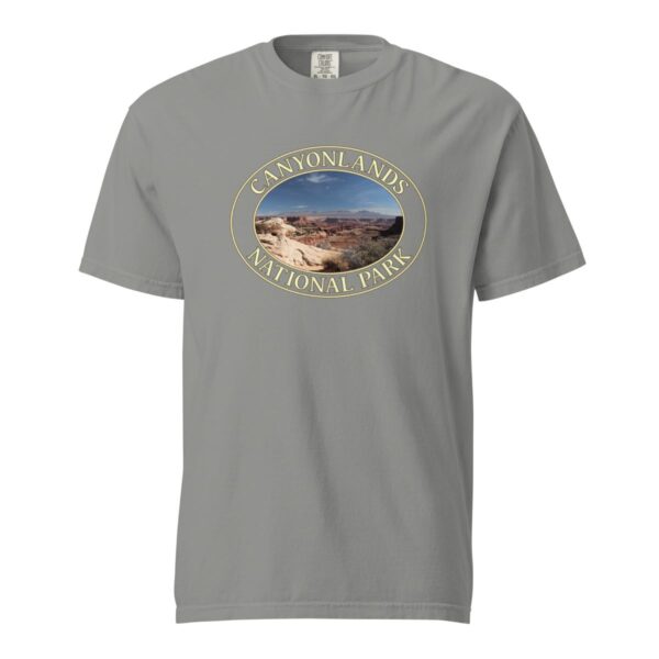 Grey Comfort Colors heavyweight T-shirt featuring a scenic landscape of Canyonlands National Park in Moab, framed in an oval border.