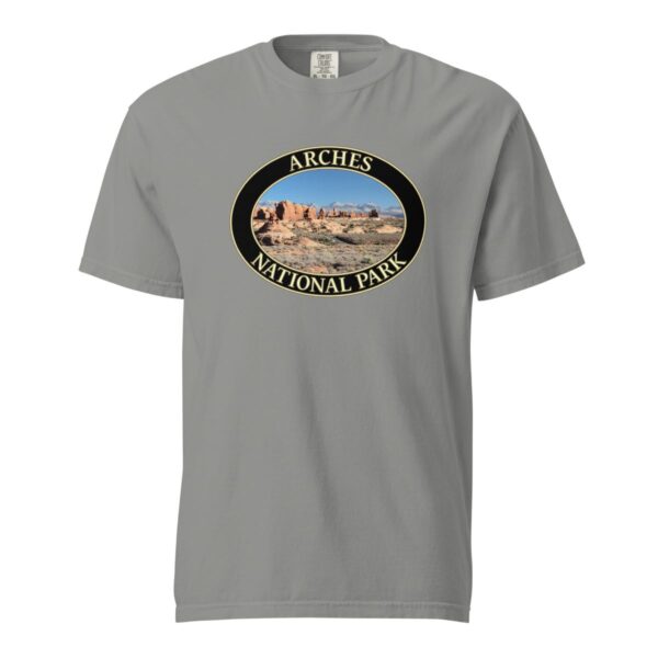 Grey Comfort Colors heavyweight T-shirt featuring a scenic view of The Windows at Arches National Park, framed in an oval border.