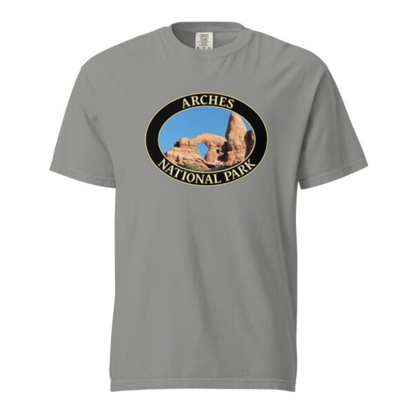 Grey Comfort Colors heavyweight T-shirt featuring a scenic view of Turret Arch at Arches National Park, framed in an oval border.