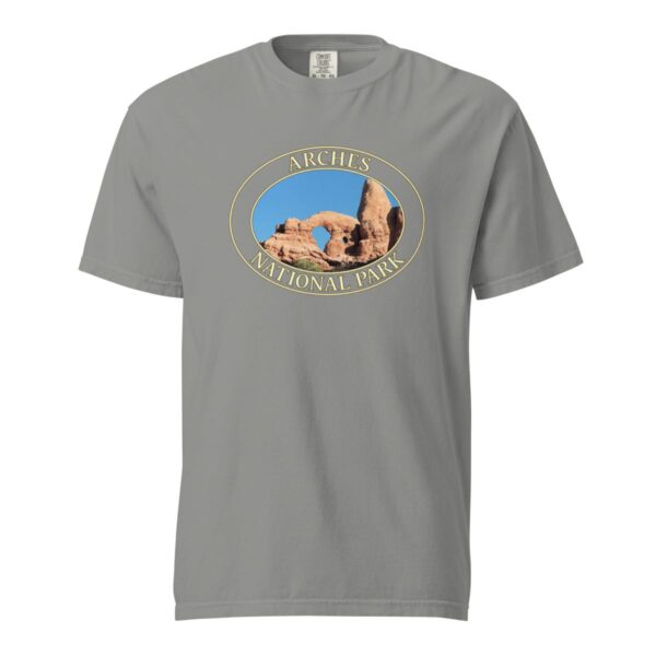 Grey Comfort Colors heavyweight T-shirt featuring a scenic view of Turret Arch at Arches National Park, framed in an oval border.