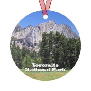 Yosemite National Park ornament featuring Yosemite Falls, printed on a 3.5-inch aluminum circle with a red ribbon for hanging