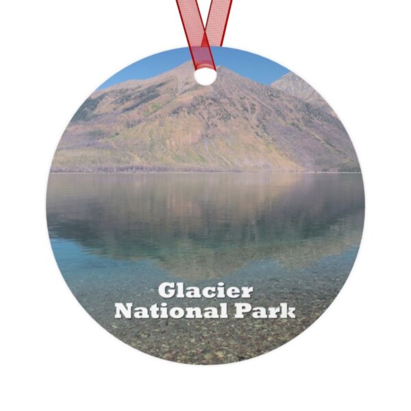 Glacier National Park ornament featuring the iconic Lake McDonald, printed on a 3.5-inch aluminum circle with a red ribbon for hanging