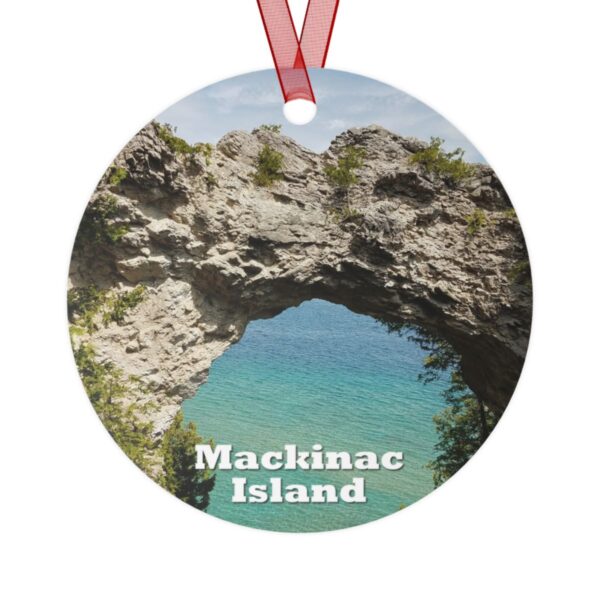 Mackinac Island ornament featuring the iconic Arch Rock, printed on a 3.5-inch aluminum circle with a red ribbon for hanging