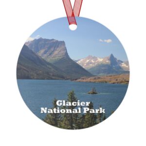 Glacier National Park ornament featuring Saint Mary Lake with Wild Goose Island, printed on a 3.5-inch aluminum circle with a red ribbon for hanging.