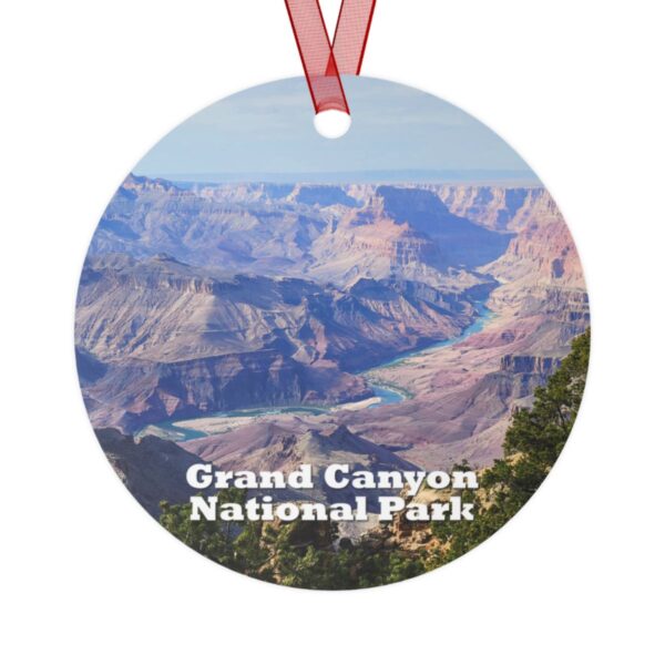 Grand Canyon National Park ornament featuring a vibrant image of the Colorado River, printed on a 3.5-inch aluminum circle with a red ribbon for hanging.