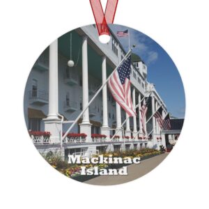 Mackinac Island ornament featuring the Grand Hotel, printed on a 3.5-inch aluminum circle with a red ribbon for hanging