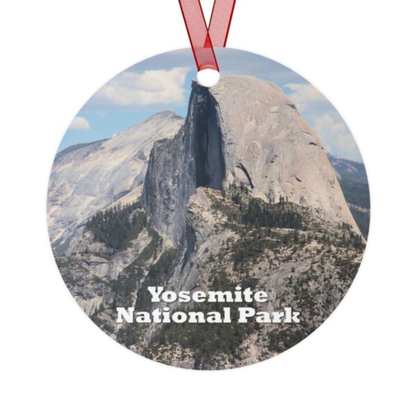 Yosemite National Park ornament featuring a closeup of Half Dome, printed on a 3.5-inch aluminum circle with a red ribbon for hanging