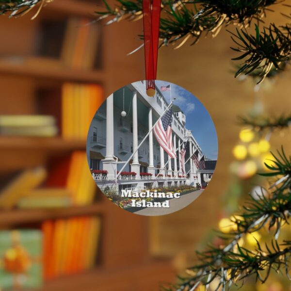 Mackinac Island ornament featuring the Grand Hotel, printed on a 3.5-inch aluminum circle with a red ribbon for hanging