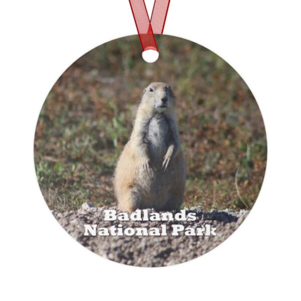 Prairie dog ornament featuring wildlife from Badlands National Park, 3.5-inch aluminum design with red ribbon