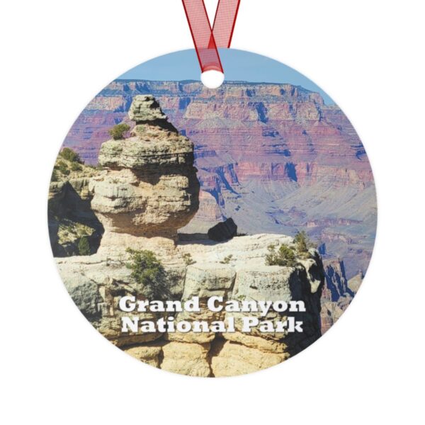 Grand Canyon National Park ornament featuring the unique Duck Rock formation, printed on a 3.5-inch aluminum circle with a red ribbon for hanging