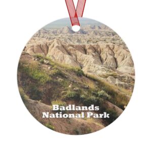 Big Horn Sheep ornament featuring wildlife at Badlands National Park, 3.5-inch aluminum design with red ribbon