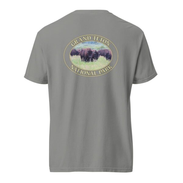 Grey Comfort Colors heavyweight T-shirt featuring a scenic image of wild buffalo grazing at Grand Teton National Park, framed in an oval border.