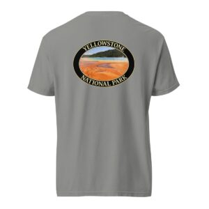 Grey Comfort Colors heavyweight T-shirt featuring a vibrant image of the Grand Prismatic Spring at Yellowstone National Park, framed in an oval border.