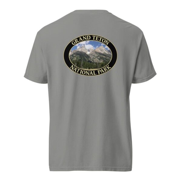 Grey Comfort Colors heavyweight T-shirt featuring a scenic image of the Grand Teton Mountains at Grand Teton National Park, framed in an oval border.