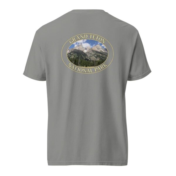 Grey Comfort Colors heavyweight T-shirt featuring a scenic image of the Grand Teton Mountains at Grand Teton National Park, framed in an oval border.