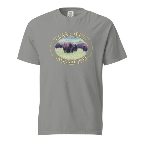 Grey Comfort Colors heavyweight T-shirt featuring a scenic image of wild buffalo grazing at Grand Teton National Park, framed in an oval border.