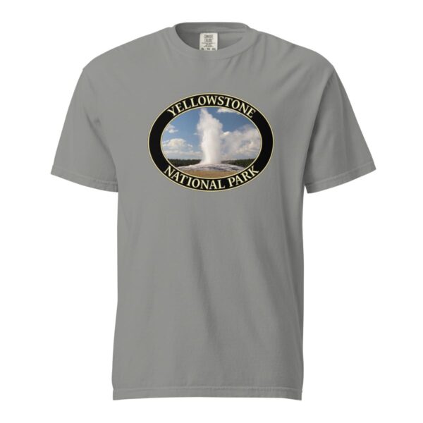 Grey Comfort Colors heavyweight T-shirt featuring a scenic image of the Old Faithful Geyser erupting at Yellowstone National Park, framed in an oval border.