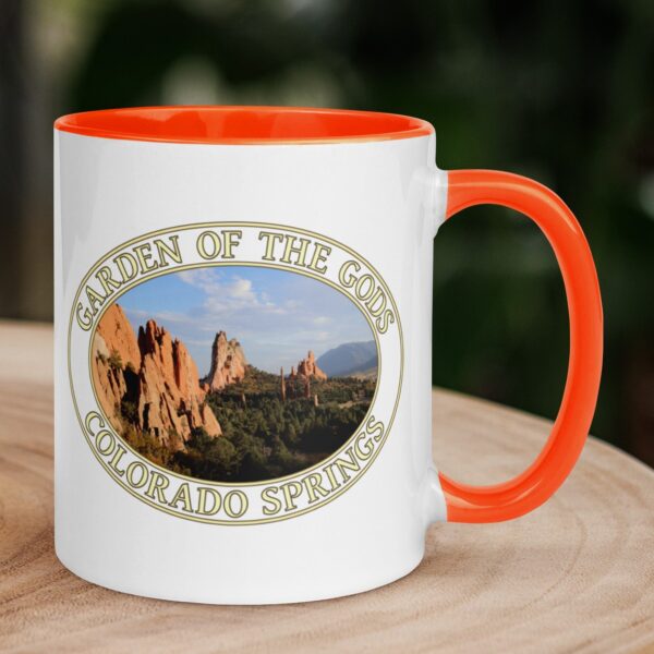 Garden of the Gods Colorado Springs coffee mug featuring red rock formations and Pikes Peak, with a colorful handle and interior.