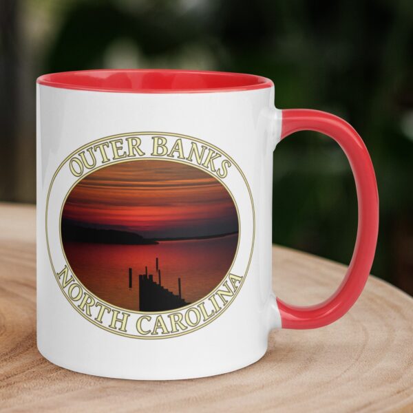 Albemarle Sound sunset coffee mug featuring a scenic red and orange sunset over the water with a wooden dock silhouette in Kitty Hawk, Outer Banks, North Carolina.